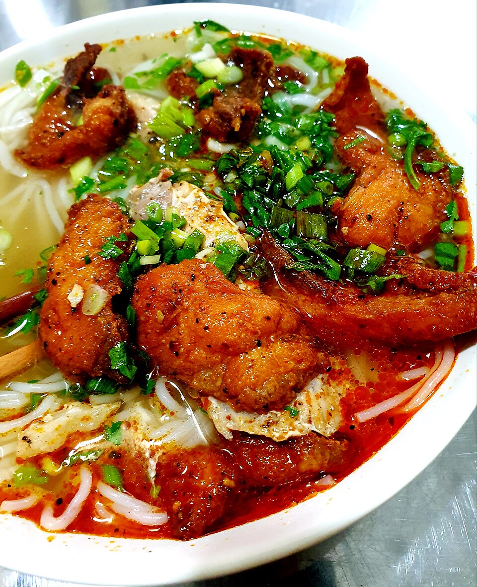 Bun ca: fish noodle soup with fried fish and herbs